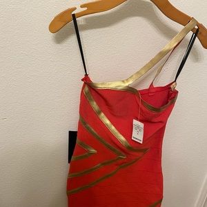A Red body con baby dress.